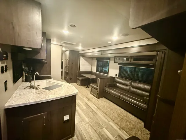 a bathroom with a sink double vanity and a mirror