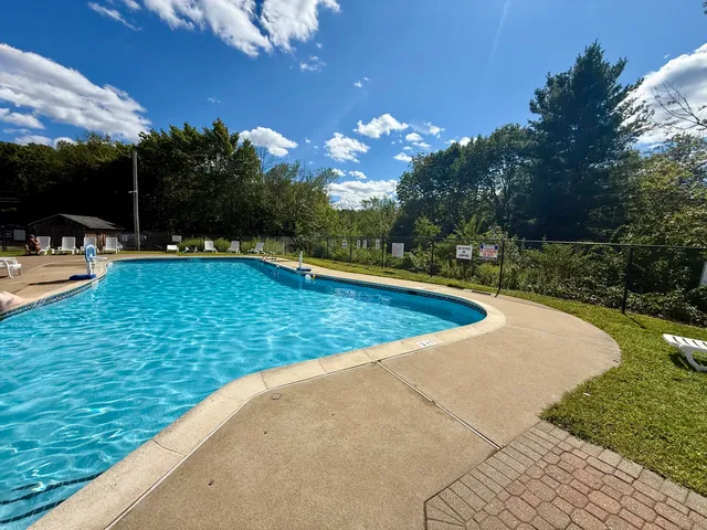 a view of a house with a yard balcony