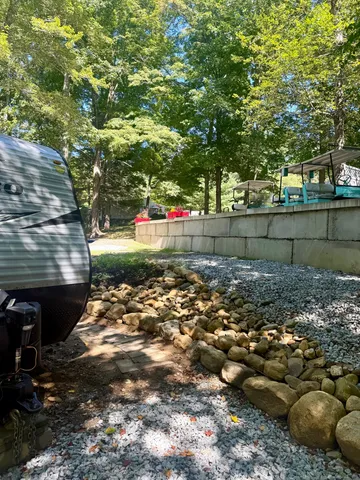 a backyard of a house with lots of green space