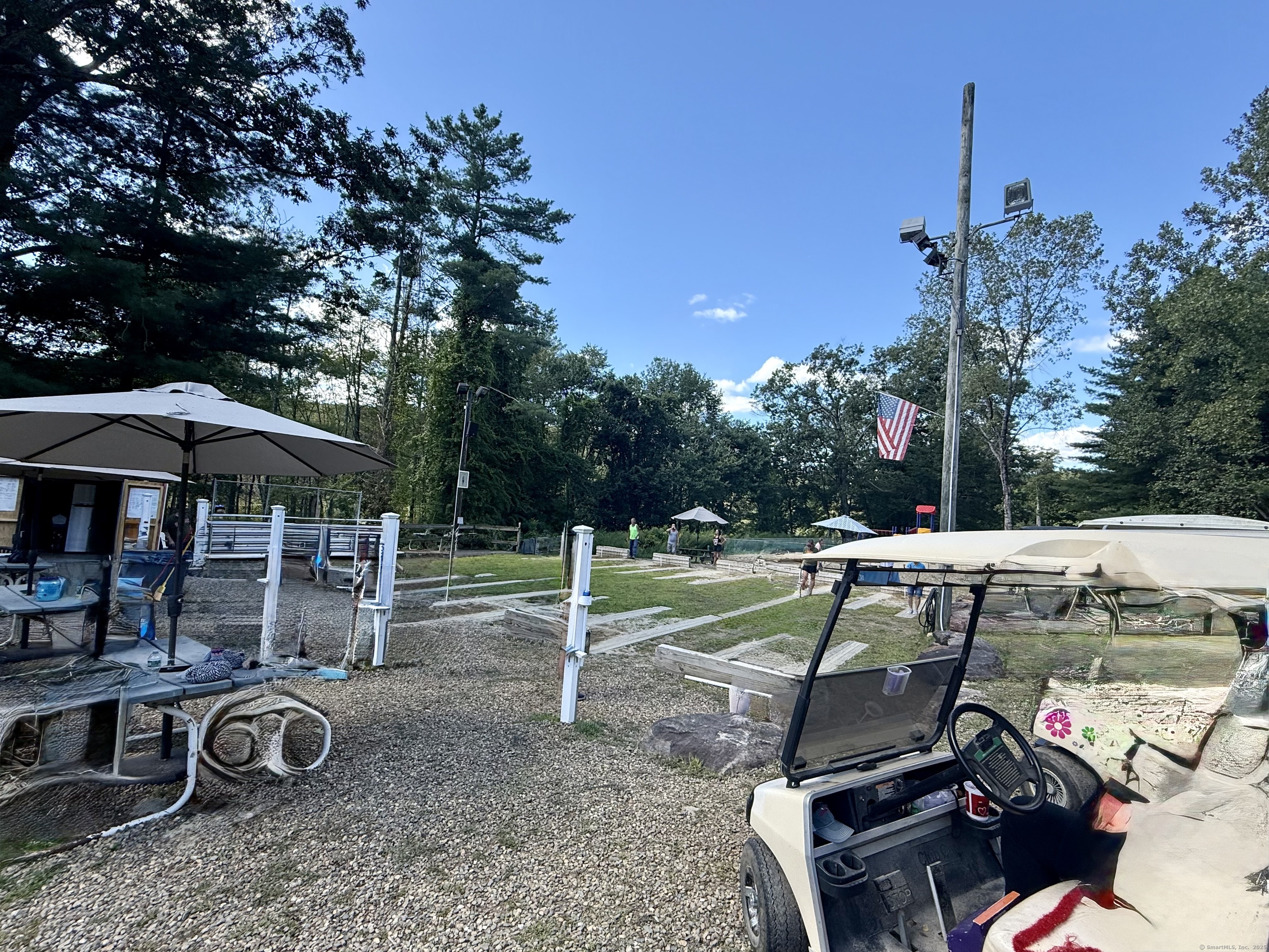 8 S Road, Unit R80 Stafford, CT 06076 - Photo 36 of 36 a view of outdoor space yard deck patio and outdoor kitchen