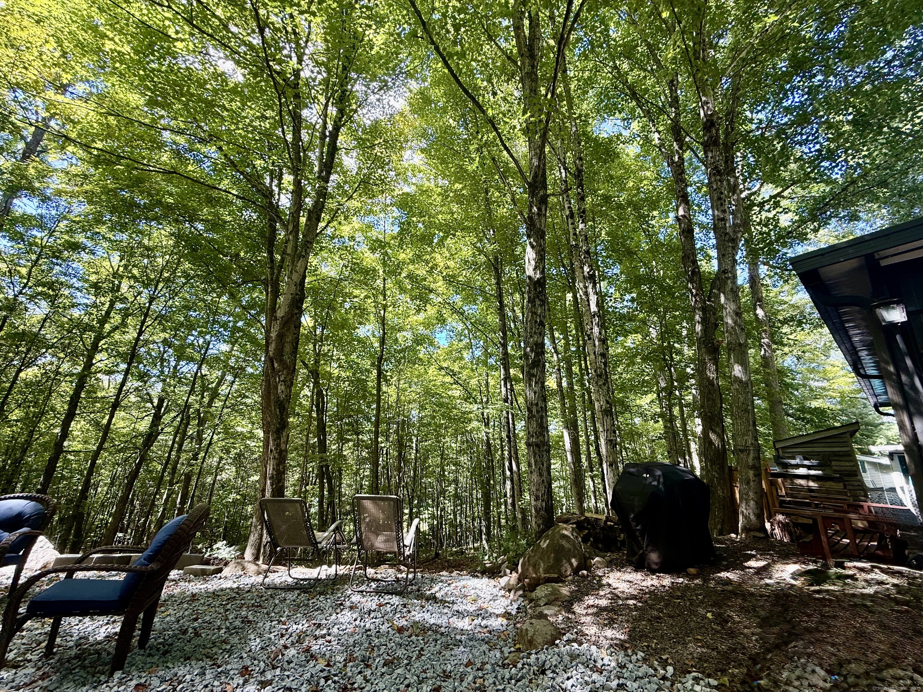 8 S Road, Unit R80 Stafford, CT 06076 - Photo 5 of 36 a view of a outdoor space