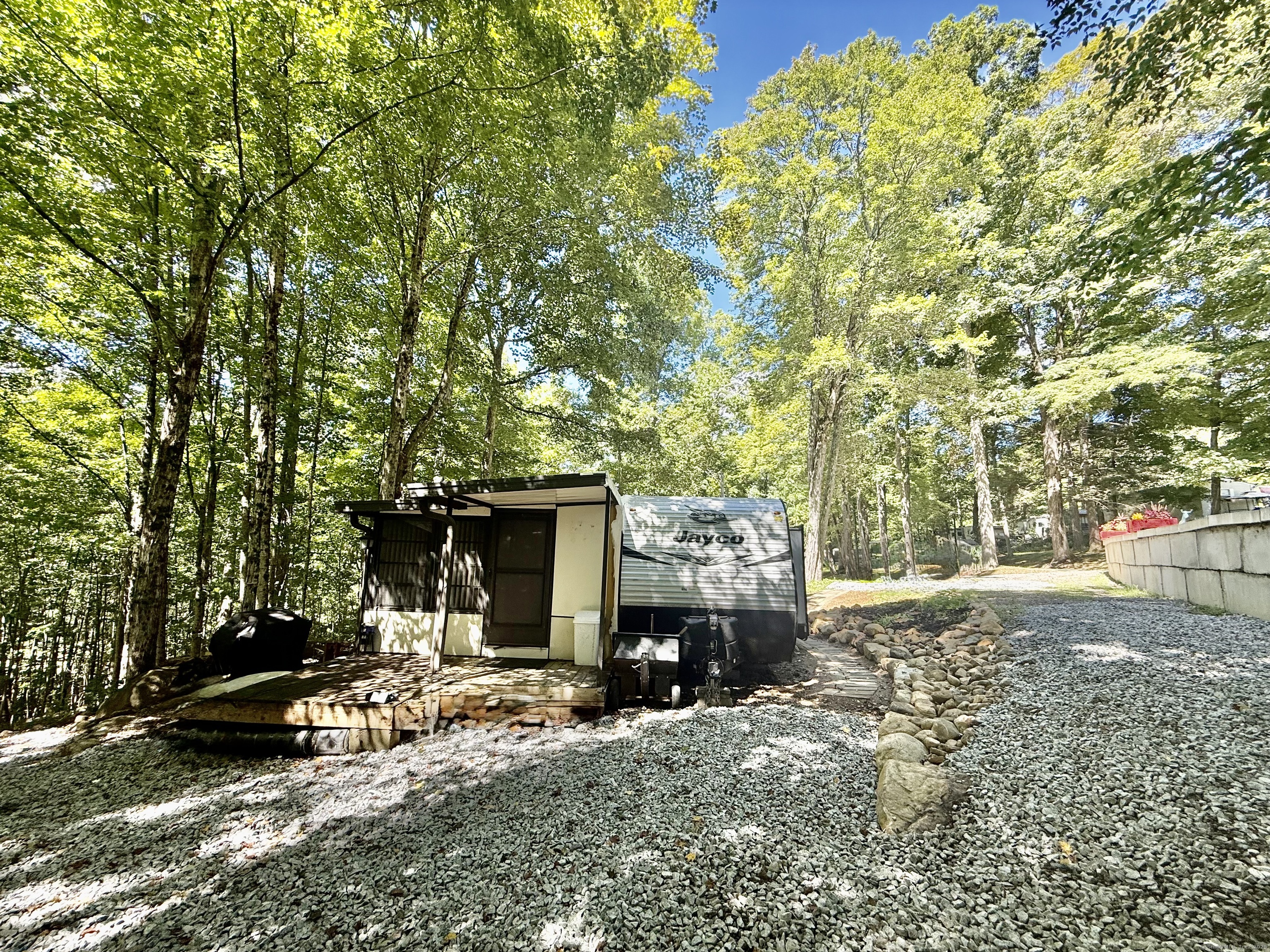 8 S Road, Unit R80 Stafford, CT 06076 - Photo 8 of 36 a view of house with backyard and furniture