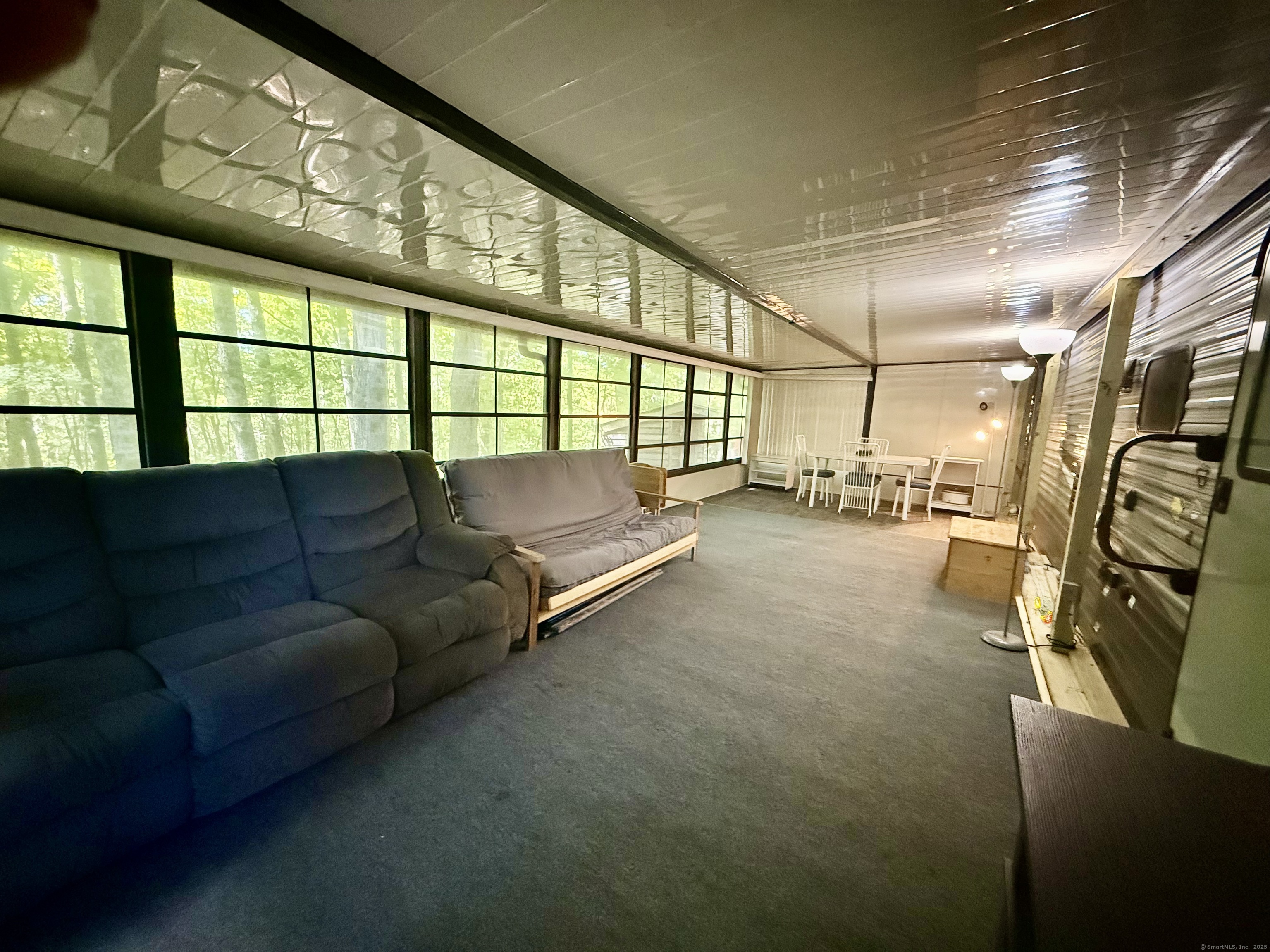 8 S Road, Unit R80 Stafford, CT 06076 - Photo 9 of 36 a living room with furniture