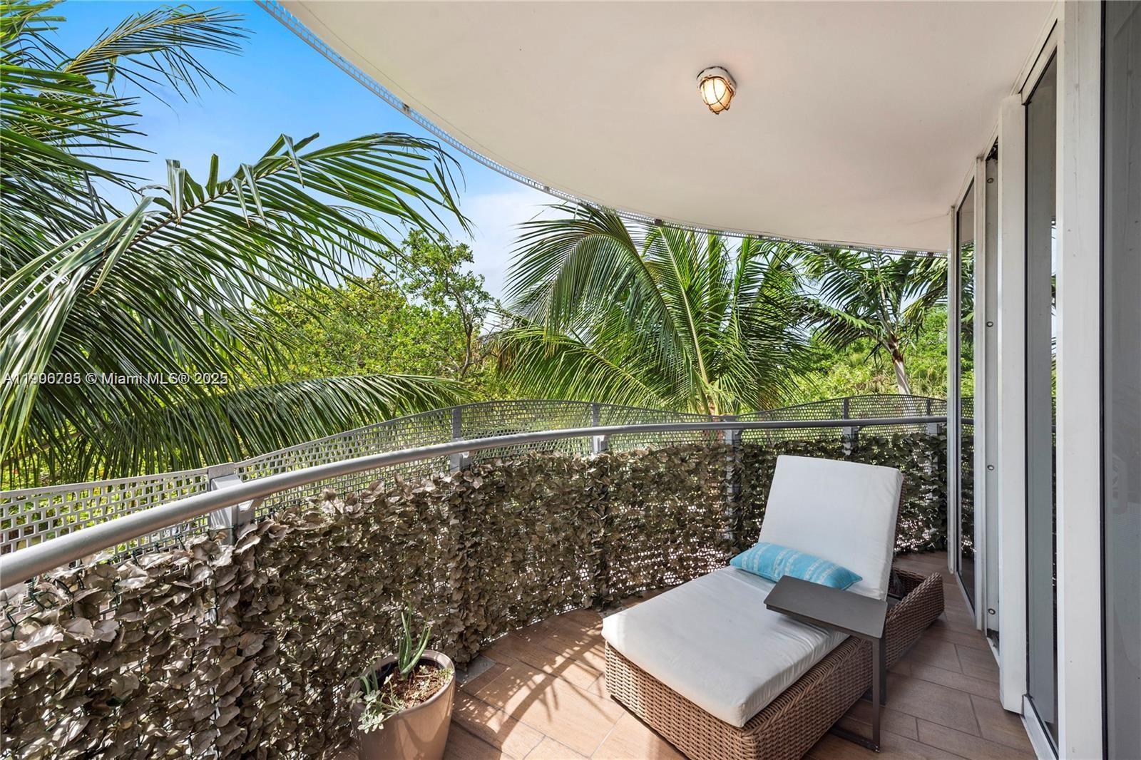 2155 Washington Court, Unit 309 Miami Beach, FL 33139 - Photo 22 of 23 a view of a balcony with chairs