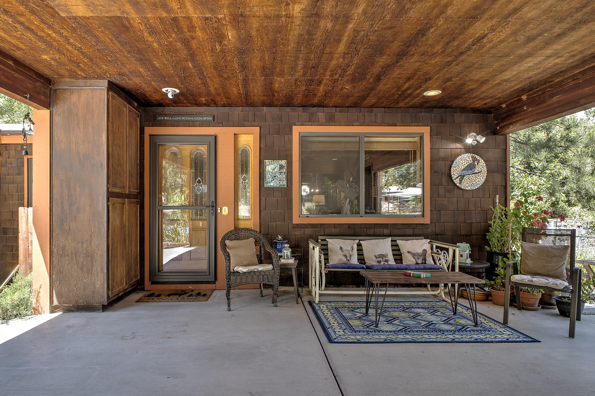 53394 Tollgate Road Idyllwild, CA 92549 - Photo 14 of 53 a living room with furniture a window and a chandelier