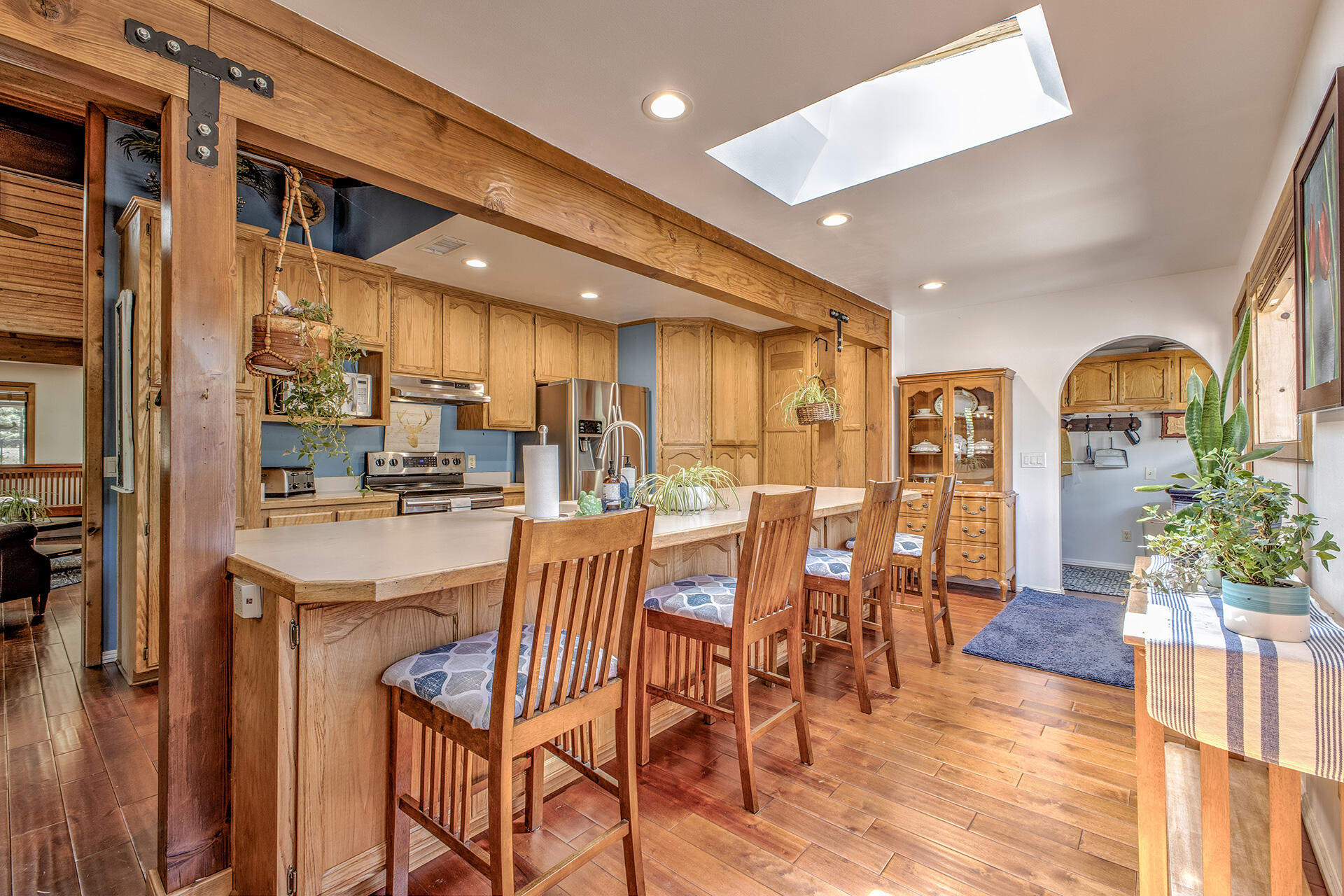 53394 Tollgate Road Idyllwild, CA 92549 - Photo 24 of 53 a dining hall with stainless steel appliances lots of wooden furniture