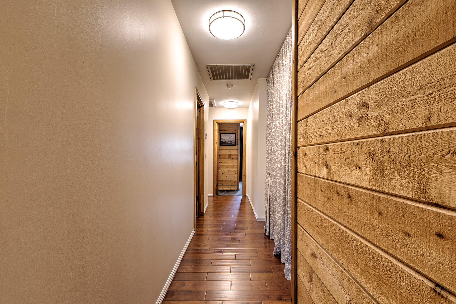 53394 Tollgate Road Idyllwild, CA 92549 - Photo 30 of 53 a view of a hallway with wooden floor