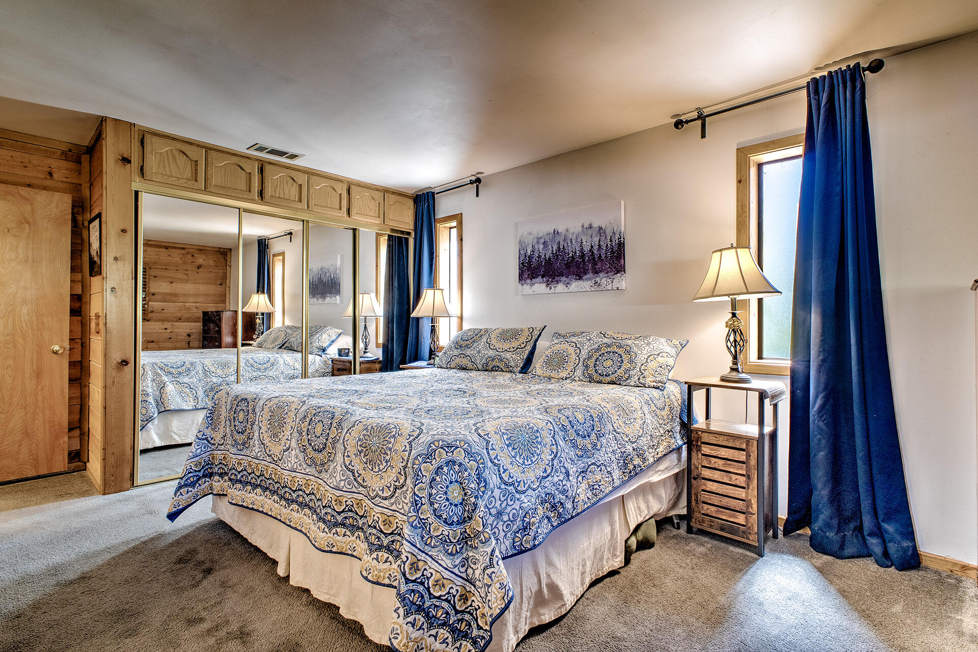 53394 Tollgate Road Idyllwild, CA 92549 - Photo 33 of 53 a bedroom with a large bed and a large window