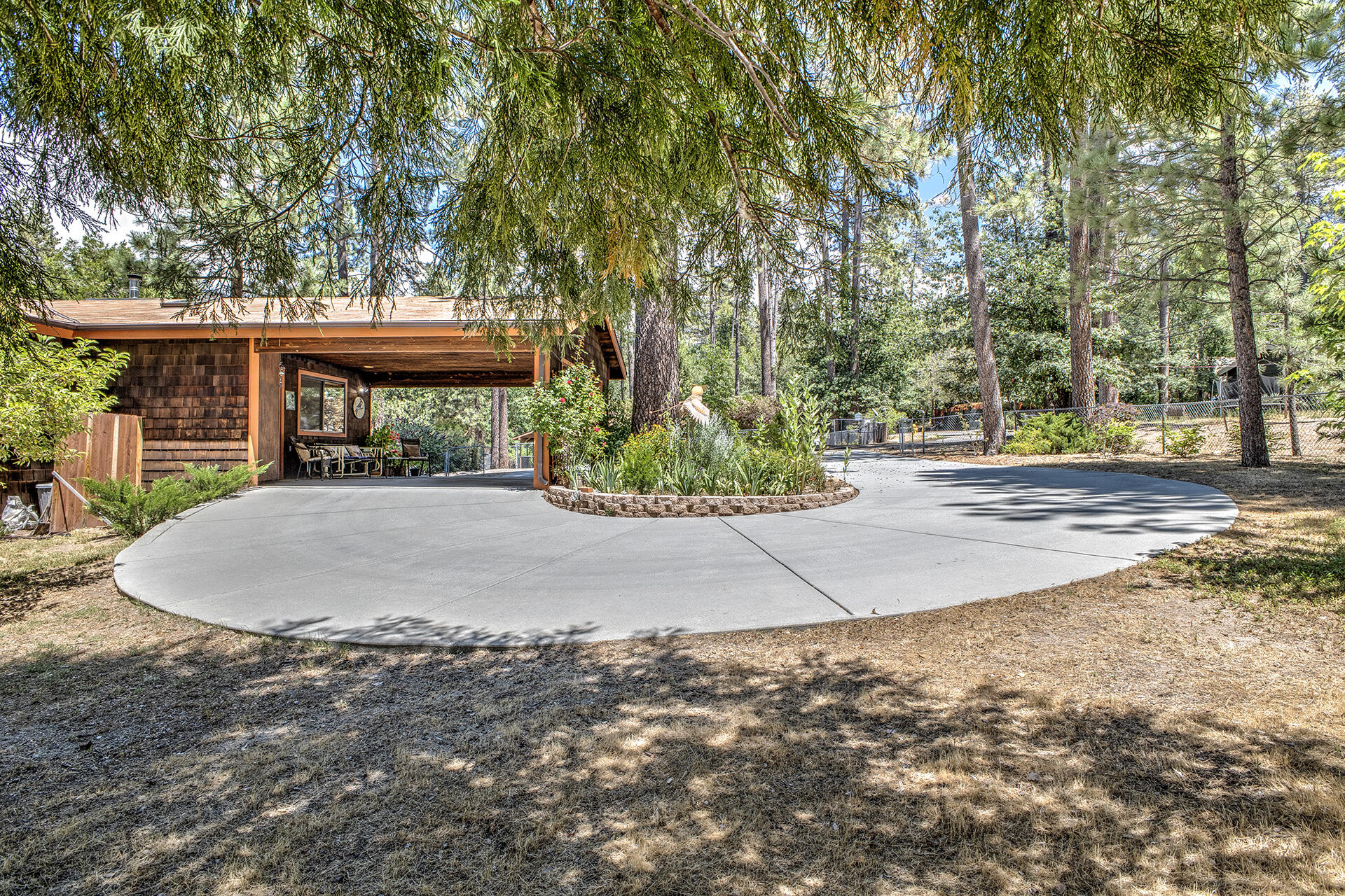 53394 Tollgate Road Idyllwild, CA 92549 - Photo 9 of 53 a view of a house with a small yard and large trees