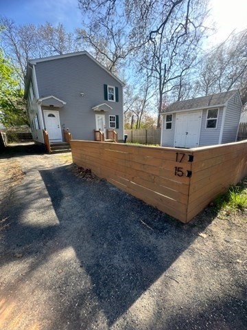 15-17 Otis Court, Unit 15 Springfield, MA 01119 - Photo 2 of 16 a view of a house with a yard