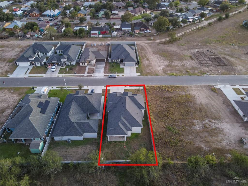 522 La Pointe Avenue Alton, TX 78573 - Photo 22 of 25 an aerial view of a house with a yard