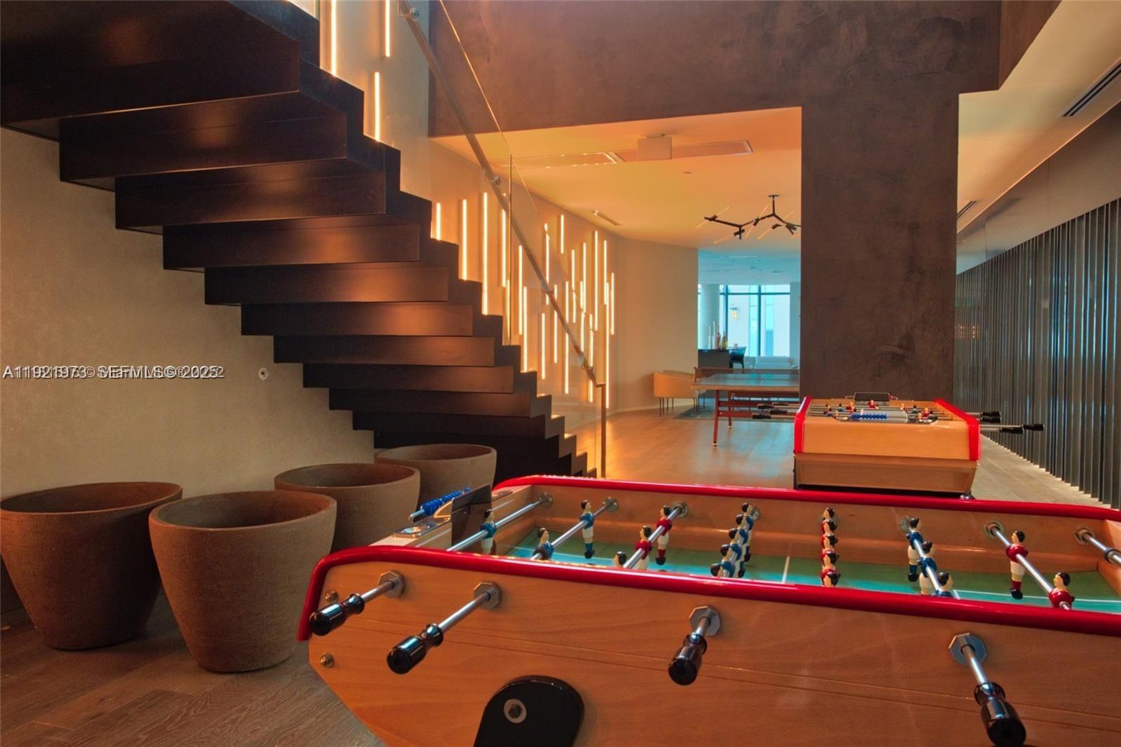 480 Northeast 31st Street, Unit 804 Miami, FL 33137 - Photo 17 of 39 a view of gym equipment and stairs