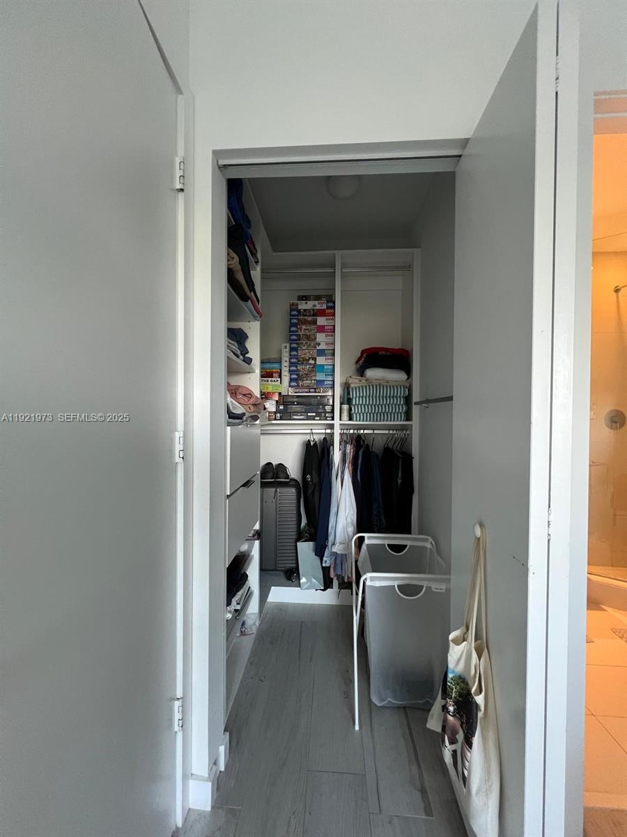 480 Northeast 31st Street, Unit 804 Miami, FL 33137 - Photo 35 of 39 a view of a livingroom with storage and utility room