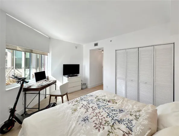 a utility room with sink dryer and washer