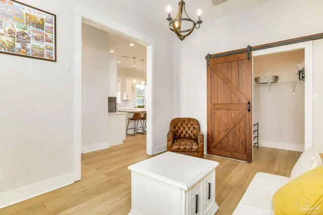a living room with furniture and a table