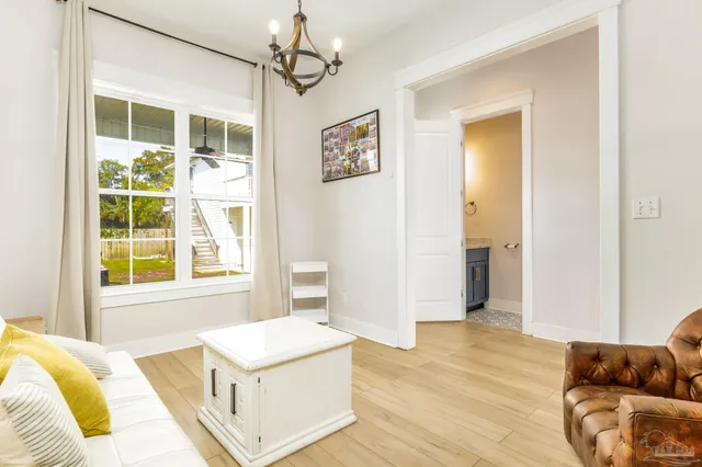 a living room with a couch and a window