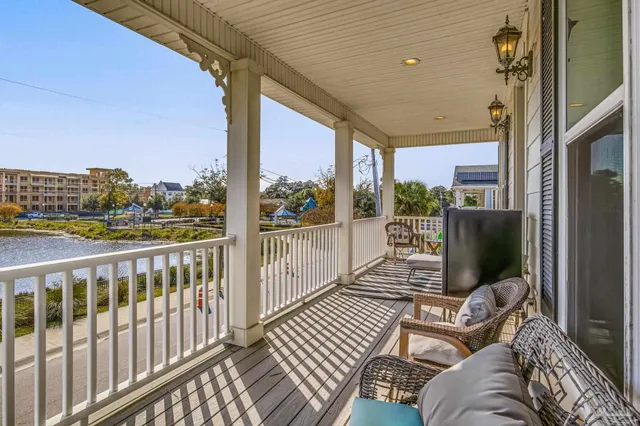 a view of a balcony with chairs