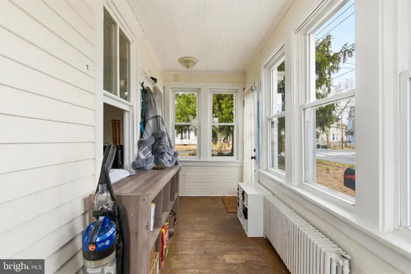 a view of entryway with a front door