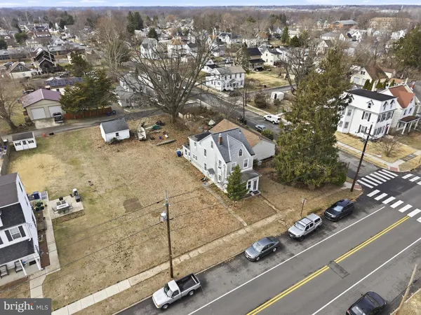 an aerial view of a highlighted house