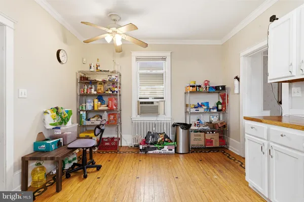 a view of a workspace with furniture and toys