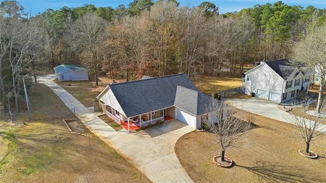 a view of a house with a street