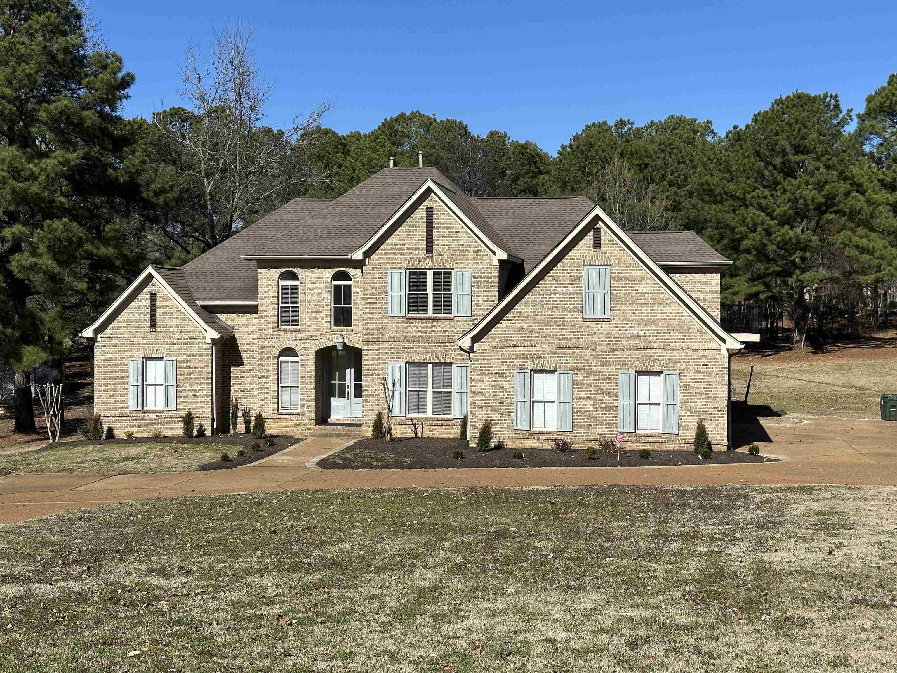 55 Hickory Nut Road Piperton, TN 38017 - Photo 1 of 40 View of front of house with brick siding and a shingled roof