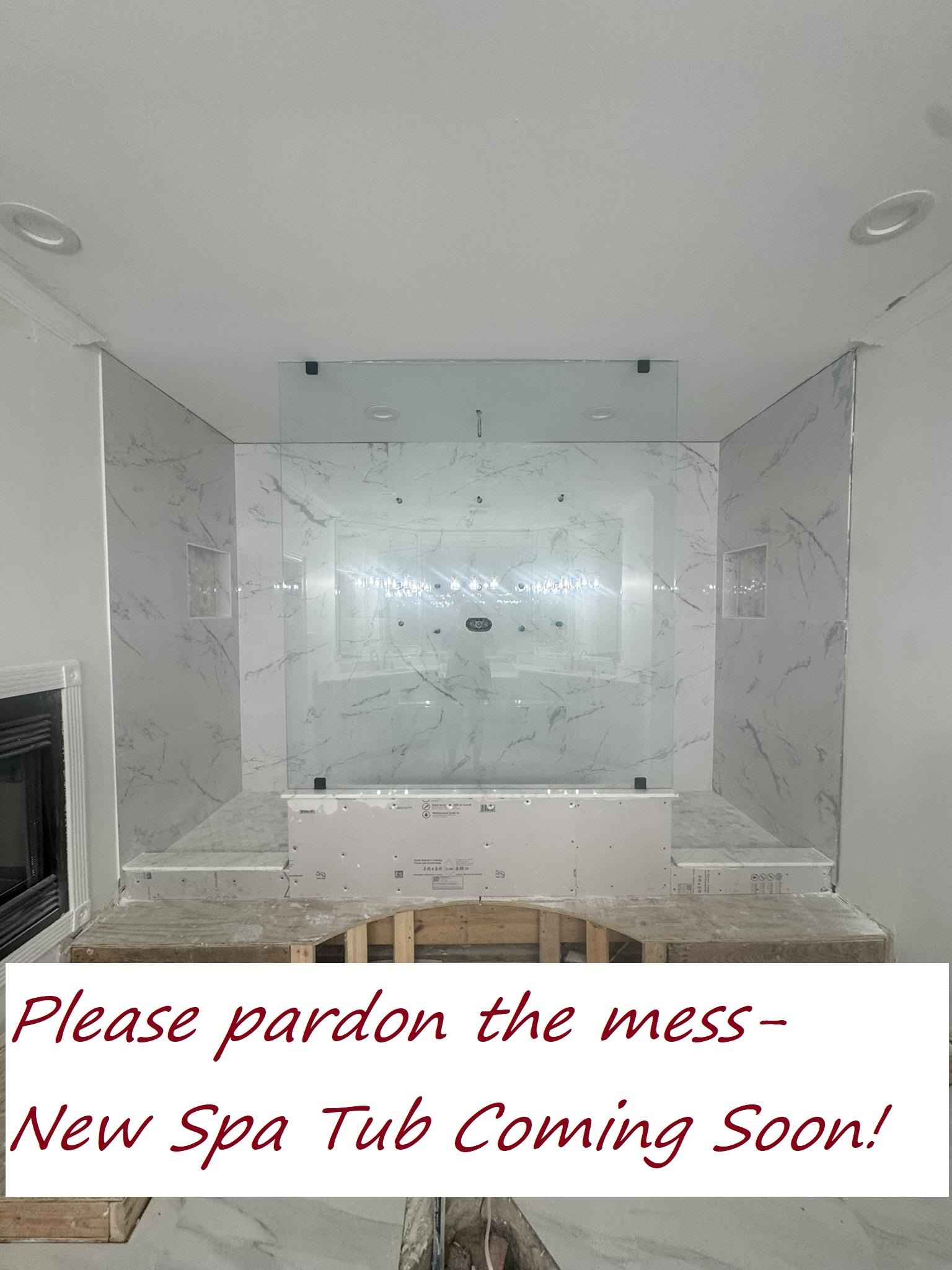 55 Hickory Nut Road Piperton, TN 38017 - Photo 14 of 40 Bathroom with heating unit, marble finish floor, and a fireplace