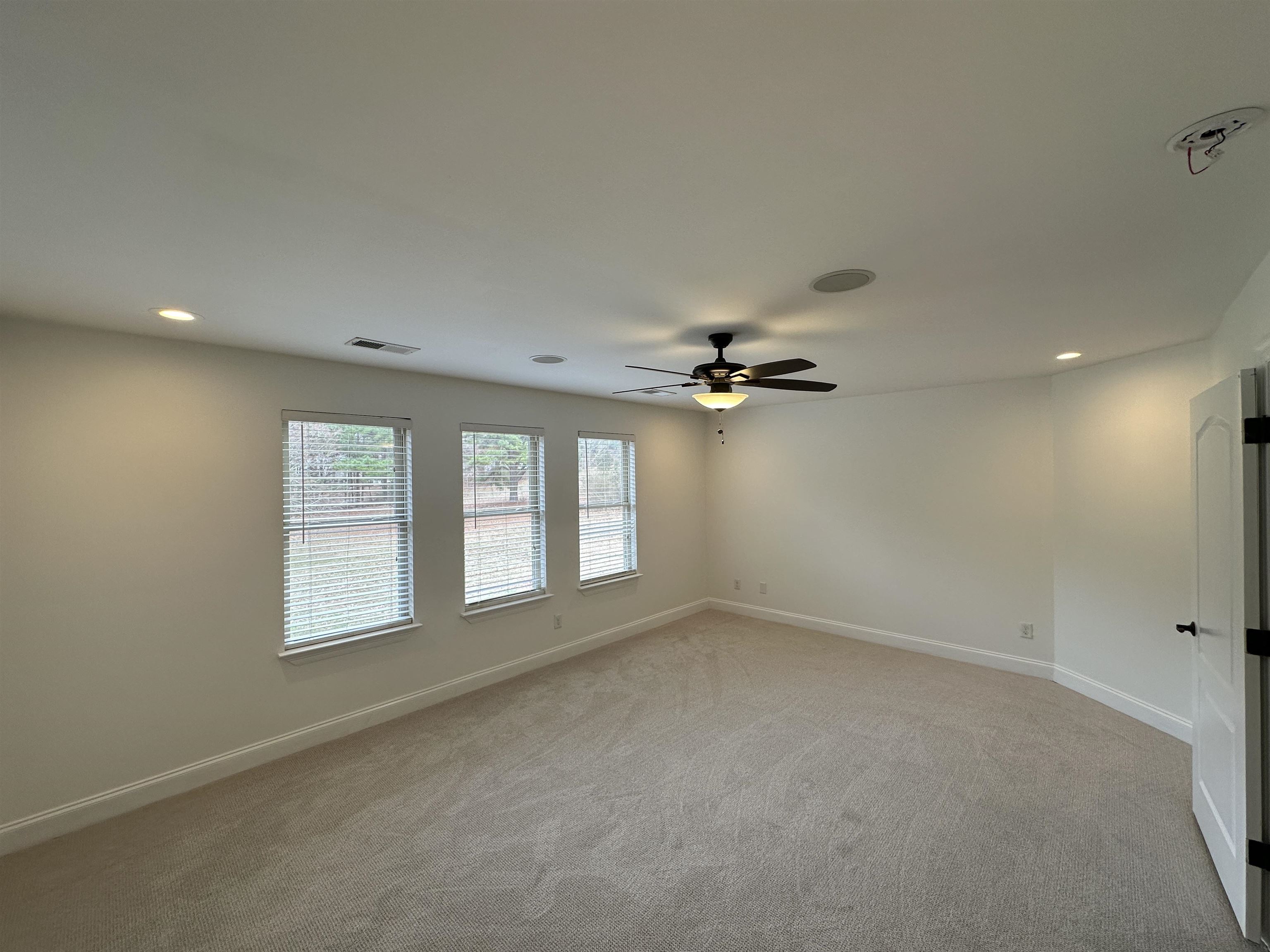 55 Hickory Nut Road Piperton, TN 38017 - Photo 25 of 40 Spare room featuring recessed lighting, baseboards, visible vents, and light carpet