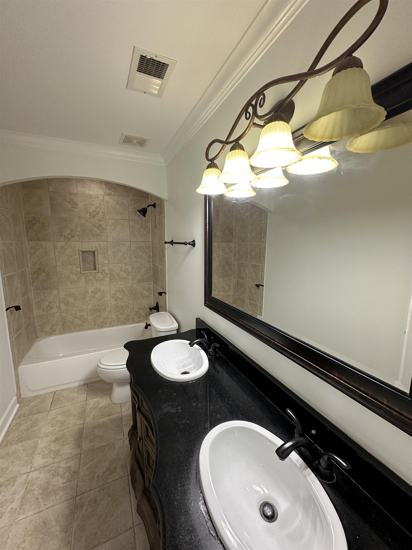 55 Hickory Nut Road Piperton, TN 38017 - Photo 26 of 40 Full bath with visible vents, ornamental molding, and a sink