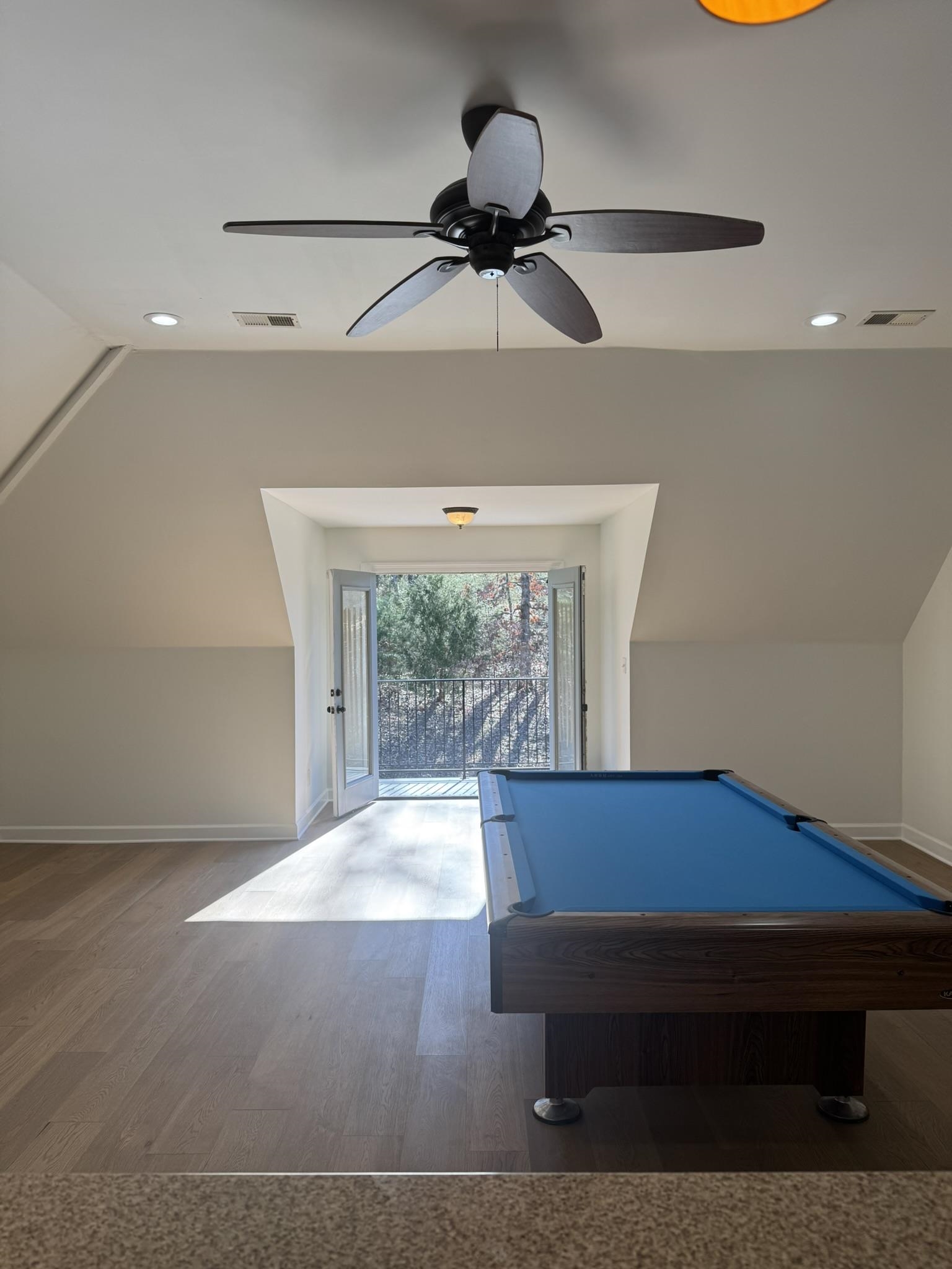 55 Hickory Nut Road Piperton, TN 38017 - Photo 33 of 40 Recreation room featuring lofted ceiling, wood finished floors, and visible vents