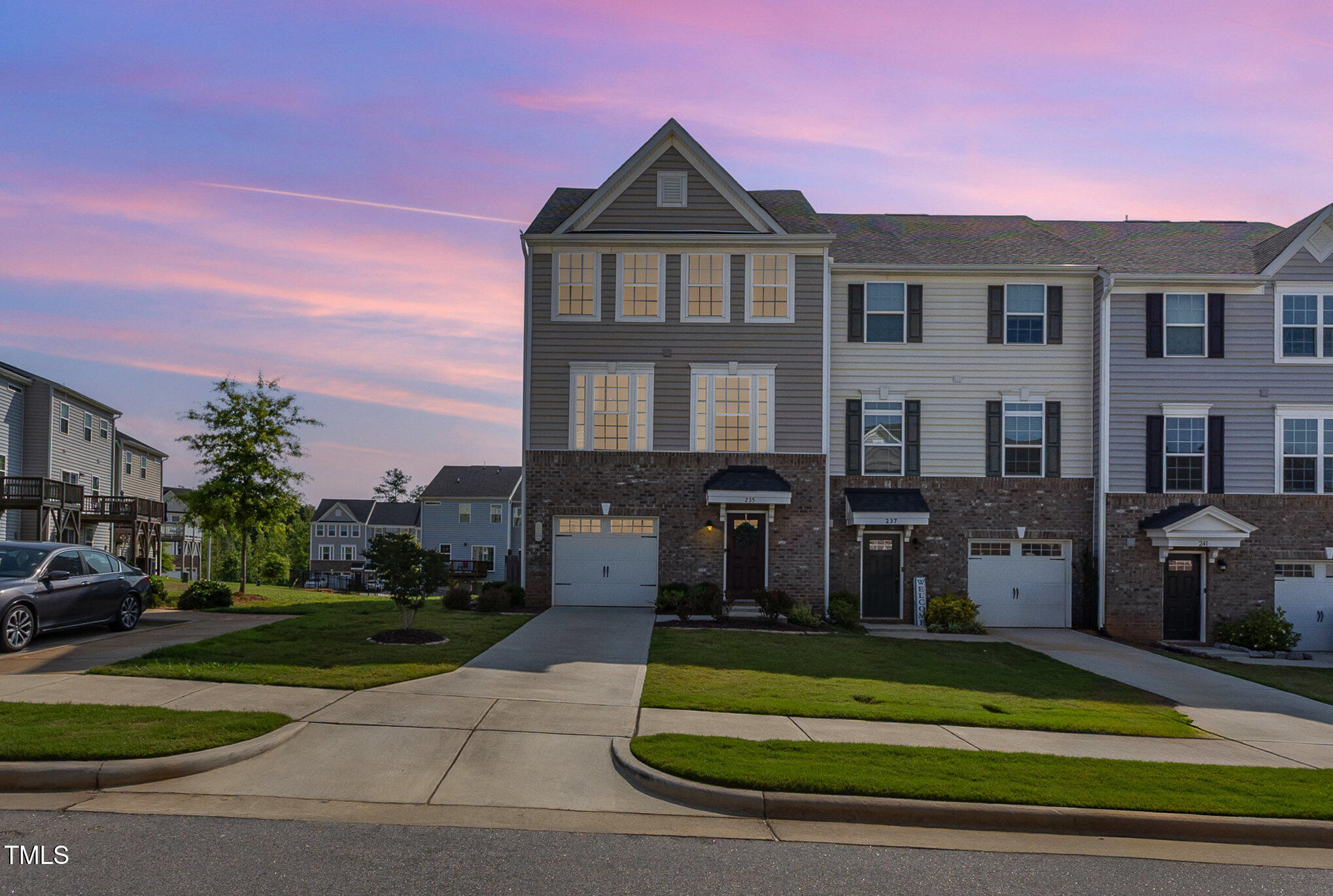235 Misty Pike Drive Raleigh, NC 27603 - Photo 1 of 29 a front view of a house with a yard