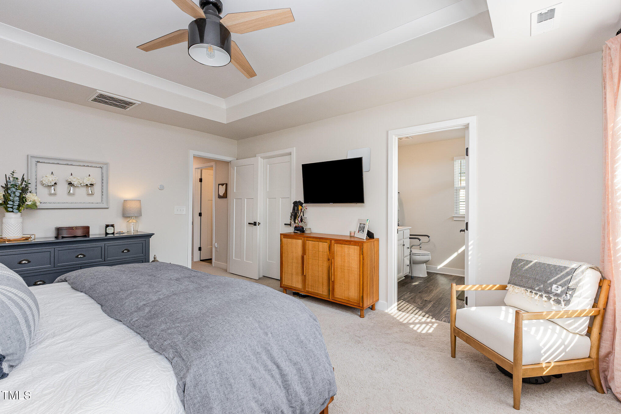 235 Misty Pike Drive Raleigh, NC 27603 - Photo 16 of 29 a spacious bedroom with a bed and furniture
