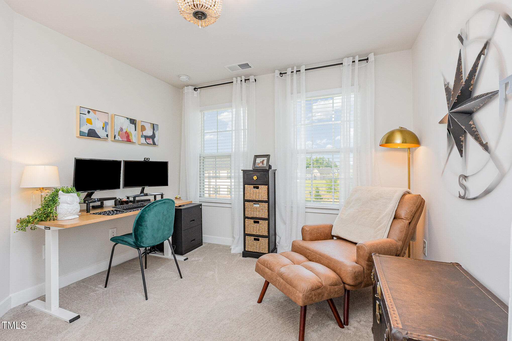 235 Misty Pike Drive Raleigh, NC 27603 - Photo 19 of 29 a workspace with furniture and a window