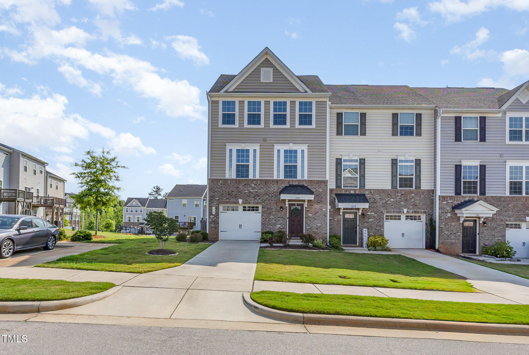 235 Misty Pike Drive Raleigh, NC 27603 - Photo 28 of 29 a front view of a house with a yard