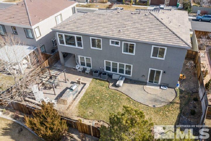 10575 Kenai Drive Reno, NV 89521 - Photo 3 of 40 a aerial view of a house with swimming pool and sitting area