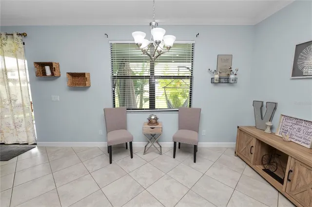 a bathroom with a granite countertop sink double vanity granite tub shower and a mirror