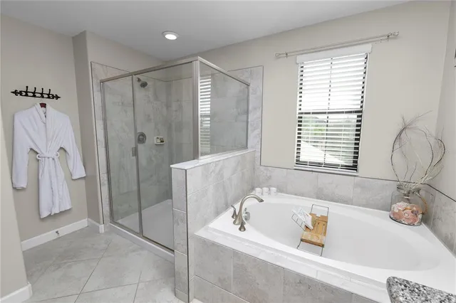 a view of a livingroom with furniture and entryway