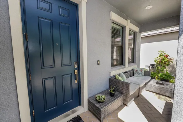 a kitchen with stainless steel appliances granite countertop a stove a sink dishwasher and a refrigerator with cabinets