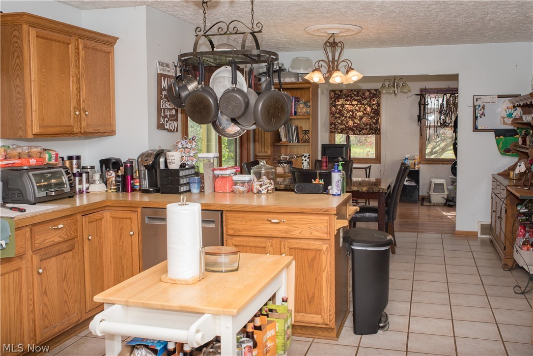 3810 Dawley Road Ravenna, OH 44266 - Photo 5 of 35 1st Floor = View from Dining Room thru Kitchen to Breakfast nook and on thru to Sunroom/Office