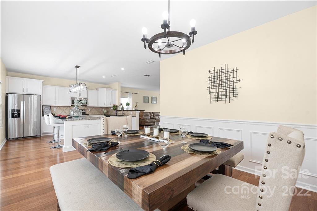 2219 Durand Road Fort Mill, SC 29715 - Photo 12 of 39 a kitchen with a dining table and chairs