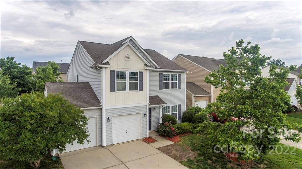2219 Durand Road Fort Mill, SC 29715 - Photo 2 of 39 a front view of a house with a yard
