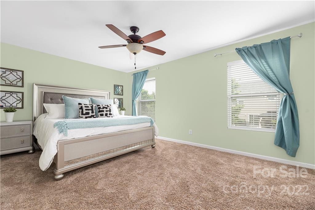 2219 Durand Road Fort Mill, SC 29715 - Photo 21 of 39 a bedroom with a large bed and a window