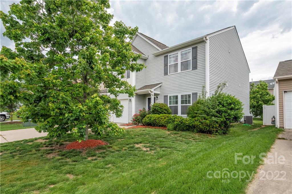 2219 Durand Road Fort Mill, SC 29715 - Photo 29 of 39 a front view of a house with a yard and trees