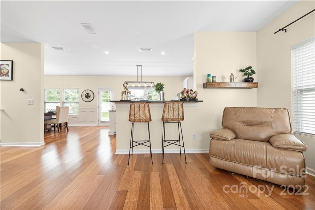 2219 Durand Road Fort Mill, SC 29715 - Photo 6 of 39 a living room with furniture and wooden floor