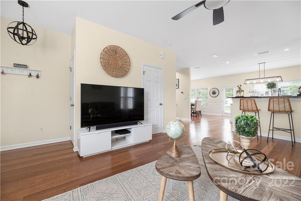 2219 Durand Road Fort Mill, SC 29715 - Photo 9 of 39 a living room with furniture and a flat screen tv