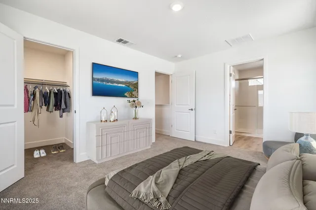 a bathroom with a shower sink and mirror