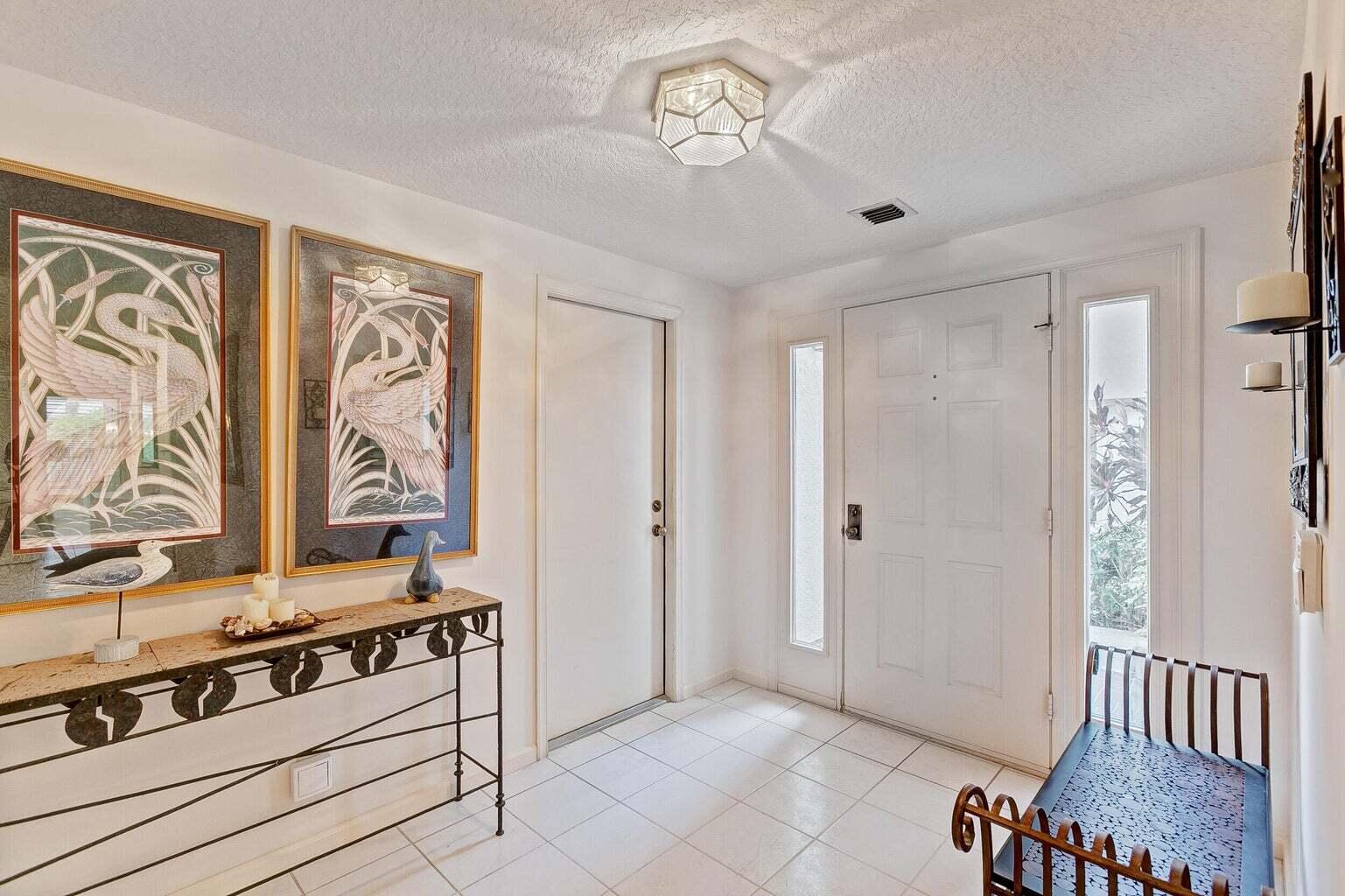 16151 West Bay Drive, Unit 161 Jupiter, FL 33477 - Photo 18 of 19 a view of a hallway with closet area