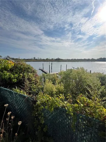 a view of a lake and outdoor space