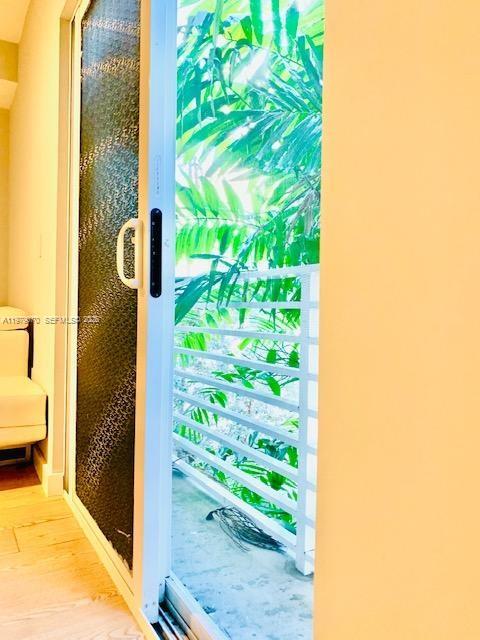 619 Meridian Avenue, Unit 4 Miami Beach, FL 33139 - Photo 12 of 30 a bathroom with a tub and shower