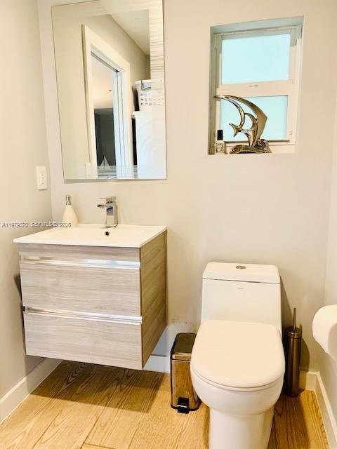 619 Meridian Avenue, Unit 4 Miami Beach, FL 33139 - Photo 19 of 30 a bathroom with a sink and a toilet